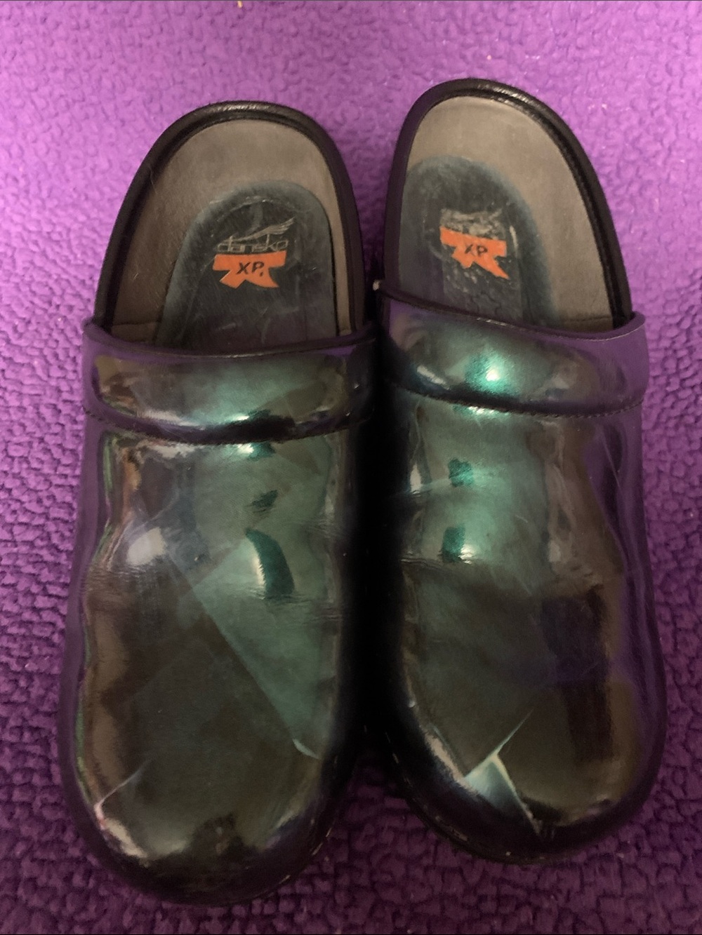 Dansko Iridescent Green-Blue Patent Clogs